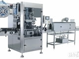 Слийв етикетираща машина (Sleeve labeling machine)