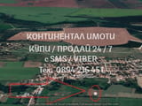 КОДг 61470. Поземлен имот 2050м2 близо до регулацията на селото, до реката и къщи, идеален за застро