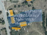 Код 63001. Голям парцел 3800м2 в центъра на селото с лице на главната асфалтова улица и второ лице н