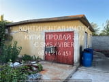 Код 63028. Монолитна стопанска сграда 60м2 в парцел от 520м2. Имотът е с вода, трифазен ток . Състои